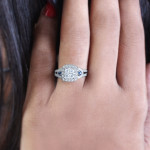1-Carat Blue Sapphire and White Diamond Cluster Engagement Ring by Yaffie in White Gold.