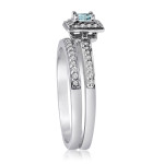 Yaffie blue and white diamond ring set with a halo - a dazzle for your special day!