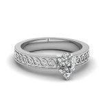Discover the Elegance of Yaffie Gold Filigree-band Pear-shaped Diamond Engagement Ring.