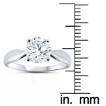 Experience love sparkle with Yaffie 1 1/2 ct TDW Diamond Clarity Enhanced Engagement Solitaire in White Gold.