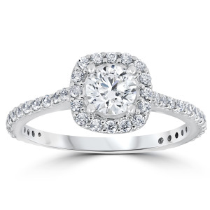 Beautifully designed, Yaffie White Gold Engagement Ring sparkles with a 1 1/5 ct TDW Round Diamond surrounded by a halo of cushion brilliance.