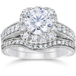 Vintage Bridal Set with a Cushion-cut Clarity Enhanced 1 3/4ct Diamond Halo in Yaffie White Gold