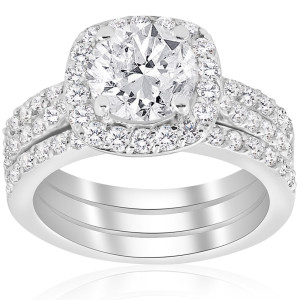 Enhanced Trio Wedding Ring Set featuring Cushion Halo Diamonds with 2 3/4 ct TDW in Yaffie White Gold.