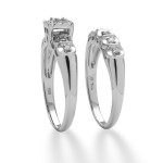 Platinum over Sterling Silver Two-Piece Bridal Set with 1/8 TCW Round Diamond by Yaffie