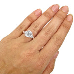 Rose Gold Trillion Diamond Engagement Ring with a Brilliant Yaffie Emerald Moissanite Centerpiece weighting 2 1/3 ct TGW