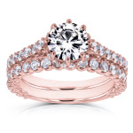 Forever Brilliant Moissanite and Diamond Bridal Set with Standing Halo in Yaffie Rose Gold, 2.1ct total weight.