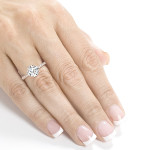 Round Moissanite and Diamond Engagement Ring in Rose Gold by Yaffie