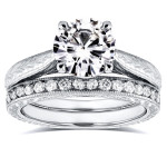 Antique-inspired Bridal Set with White Gold, 1 1/2ct Round Moissanite, and 1/3ct TDW Diamonds by Yaffie.
