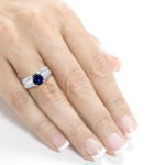 Blue Sapphire Bridal Set featuring Yaffie 1 1/4ct Round White Gold Solitaire design.