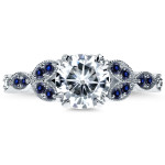 Vintage Floral Engagement Ring with Blue Sapphire, Diamond Accents and 1 1/5ct TGW Moissanite in Yaffie White Gold.