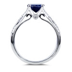 Sparkling Blue Sapphire and Shimmering Diamond Crossover Ring in White Gold by Yaffie