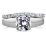 Gleaming White Gold Cushion Cut Moissanite Bridal Set with Dazzling Diamond Accents