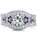 Eternally Beautiful: Yaffie Vintage Floral 3-P with Blue Sapphire, White Gold Forever One Moissanite, and 1/2ct TDW Diamonds.