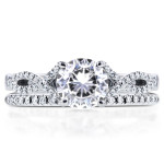 Stunning Yaffie Bridal Rings Set with White Gold, Moissanite, and Diamonds in a Unique Crossover Design