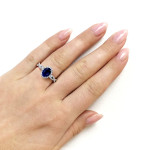 Vintage Blue Sapphire and Diamond Halo Oval Engagement Ring in White Gold by Yaffie