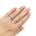 Elegant Vintage Engagement Ring with Forever One GHI Moissanite and Diamond Halo.