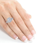 Forever Brilliant Moissanite Radiantly Shines with 2/5ct TDW Halo Diamonds on Yaffie White Gold