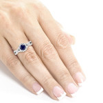 Sapphire and Diamond Halo Criss Cross Ring in White Gold by Yaffie - 1/2ct Total Diamond Weight.
