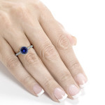 Sparkling Blue Sapphire and Diamond Bezel Ring in White Gold by Yaffie