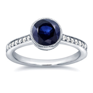 Sparkling Blue Sapphire and Diamond Bezel Ring in White Gold by Yaffie