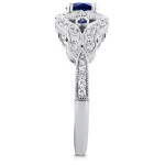 An Antique Milgrain Ring with Yaffie White Gold, Sparkling Sapphires, and 2/5ct TDW Diamonds