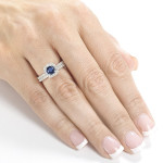 Sparkling Halo Bridal Set with Sapphire, Diamonds, and White Gold