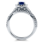 Elegant White Gold Bridal Set with Sparkling Sapphire and 3/4ct TDW Diamond Crossover Halo
