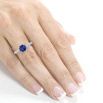 Stunning White Gold Sapphire and Diamond Engagement Ring with 8 Prong Halo