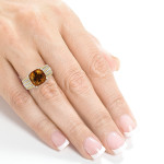 Gold Cushion with a Bright Orange Citrine and a Sparkling 1.2ct of Diamonds in a Multi-Row Channel Design from Yaffie.