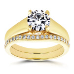 Gold Round Cut Moissanite Solemnity with 1/6ct TDW Diamond Bridal Band by Yaffie