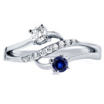 Curved Two-Stone White Gold Ring with Blue Sapphire and Diamond Accents