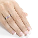 The Pink Sapphire 2-stone Ring from the Yaffie Two Collection, adorned with 1/6ct TDW Diamonds, in elegant White Gold.