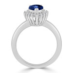 Engage with elegance in the Yaffie Gold Blue Sapphire and Diamond Halo Ring.