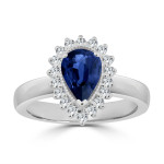 Engage with elegance in the Yaffie Gold Blue Sapphire and Diamond Halo Ring.