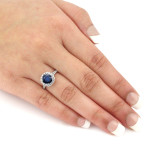 Gold Halo Engagement Ring with Blue Sapphire and Diamond Sparkle (1 1/2ct and 4/5ct TDW) by Yaffie.