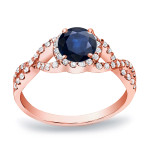 The Spectacular Yaffie Gold Engagement Ring with a 1/2ct Blue Sapphire and 1/3ct TDW Round Diamond