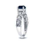 Engagement Ring with Blue Sapphire and White Diamonds, 1ct and 1/4ct TDW respectively, by Yaffie Gold