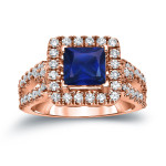 Gold Sapphire and Diamond Engagement Ring with a Halo of Sparkling Brilliance