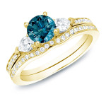 A stunning Yaffie Gold bridal set with a 1ct TDW blue round diamond.