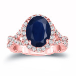 Sapphire and Diamond Halo Engagement Ring with Blue Oval Cut