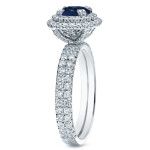 Sapphire and Diamond Halo Engagement Ring with a 3/4ct Blue Gem and 1ct Total Weight