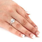Certified 2ct TDW Diamond Engagement Ring with a Rose Gold Halo by Yaffie.