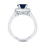 Blue and White Gold Bridal Ring Set adorned with 1ct Sapphire and 1/2ct Total Diamond Weight