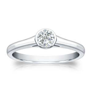 1/4ct TDW Round-cut Diamond Solitaire Bezel Engagement Ring in Yaffie Gold
