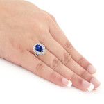 Yaffie Blue Sapphire and Diamond Ring in White Gold with Halo Accent, 3ct and 1ct TDW.