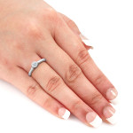 Platinum Yaffie Solitaire Engagement Ring adorned with 1/3ct TDW Bezel-set Round-cut Diamond