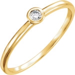 Bold & radiant, Yaffie Women 0.03ct TDW Solitaire Ring sparkles with a prong-set Round Diamond in gold.