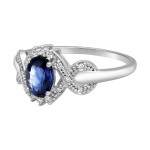 Dazzling Blue Sapphire Oval Ring with White Gold and Diamond Accents - Perfect for Engagements!