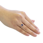 Sapphire and Diamond Oval Engagement Ring in White Gold by Yaffie with Vivid Blue Hue