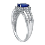 Gorgeous Vivid Blue Oval Sapphire and Diamond Halo Engagement Ring in White Gold by Yaffie
